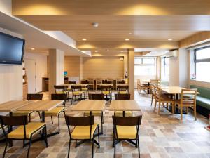 Comfort Inn Kofu tesisinde bir restoran veya yemek mekanı