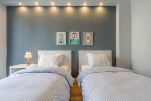 Posteľ alebo postele v izbe v ubytovaní Nordic Design 5star Apartment