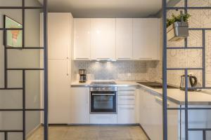 Kuchyňa alebo kuchynka v ubytovaní Nordic Design 5star Apartment