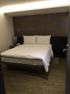 Postel nebo postele na pokoji v ubytování Hotel I Journey
