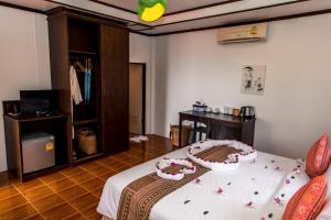Zama Resort Koh Phangan客房内的一张或多张床位