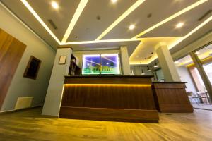 TV a/nebo společenská místnost v ubytování Hotel Pandora Residence