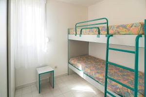 Ένα ή περισσότερα κρεβάτια σε δωμάτιο στο Vacancéole - Savanna Beach- Terrasses de Savanna +20 φωτογραφίες