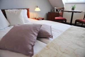 Una cama o camas en una habitación de Hotel Bonsai