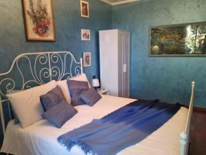 Postel nebo postele na pokoji v ubytování B&B La Dimora di Charme