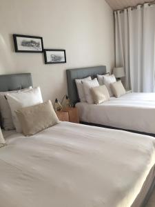 Ένα ή περισσότερα κρεβάτια σε δωμάτιο στο Ô'Maxethel