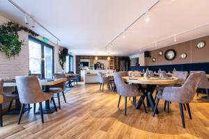 Posezení v ubytování UpperHouse Suites & More