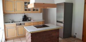 Kuchyň nebo kuchyňský kout v ubytování Landhaus Almrausch