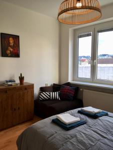 Posteľ alebo postele v izbe v ubytovaní Blu Apartment in Old Town