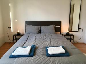 Posteľ alebo postele v izbe v ubytovaní Blu Apartment in Old Town