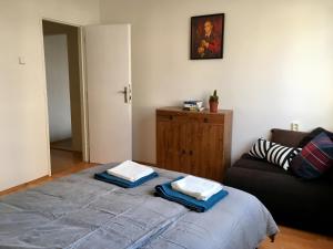 Posteľ alebo postele v izbe v ubytovaní Blu Apartment in Old Town