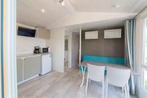 Kuchyň nebo kuchyňský kout v ubytování Camping Porto srl