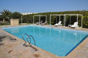 The swimming pool at or close to Gite Nadia