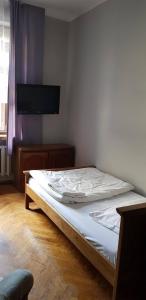 Łóżko lub łóżka w pokoju w obiekcie Hotel Azyl