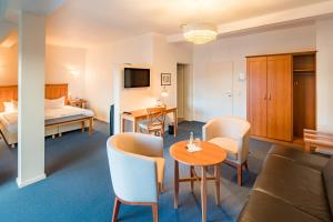 Postel nebo postele na pokoji v ubytování Hotel Brandies an der Messe