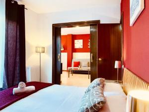 Posteľ alebo postele v izbe v ubytovaní La Pedrera Residence
