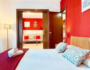 Posteľ alebo postele v izbe v ubytovaní La Pedrera Residence