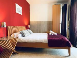 Posteľ alebo postele v izbe v ubytovaní La Pedrera Residence