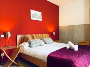 Posteľ alebo postele v izbe v ubytovaní La Pedrera Residence