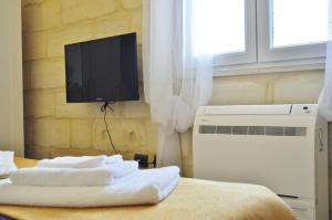 Postel nebo postele na pokoji v ubytování B&B Lecce Holidays
