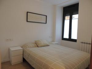 Postel nebo postele na pokoji v ubytování Ideal escapada romántica en el centro de Puigcerda