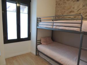 Postel nebo postele na pokoji v ubytování Ideal escapada romántica en el centro de Puigcerda