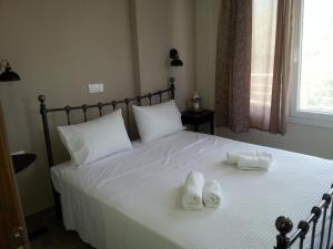 A bed or beds in a room at Villanta