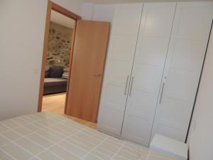 Postel nebo postele na pokoji v ubytování Ideal escapada romántica en el centro de Puigcerda