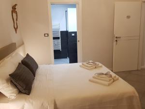 Postel nebo postele na pokoji v ubytování Il Sogno Torino Guesthouse