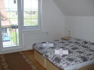 A bed or beds in a room at Privat Ivan