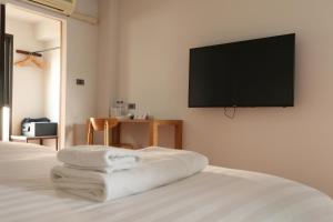 TV a/nebo společenská místnost v ubytování VIYA lodge