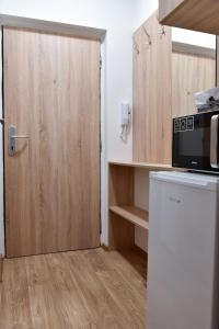 Kuchyň nebo kuchyňský kout v ubytování Apartmán-Třeboň-centrum