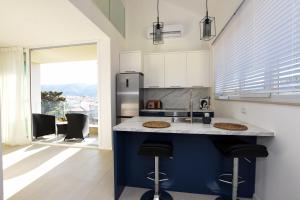 Kuchyň nebo kuchyňský kout v ubytování Apartments Villa Laura