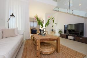 TV a/nebo společenská místnost v ubytování Apartments Villa Laura