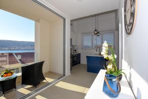 Kuchyň nebo kuchyňský kout v ubytování Apartments Villa Laura