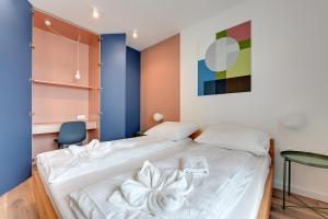Posteľ alebo postele v izbe v ubytovaní Platinium Top Floor City View