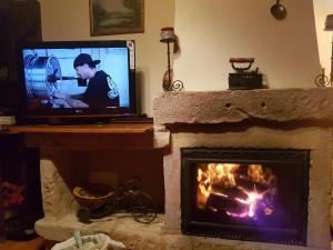 Televízia a/alebo spoločenská miestnosť v ubytovaní La Fuente de Pavia