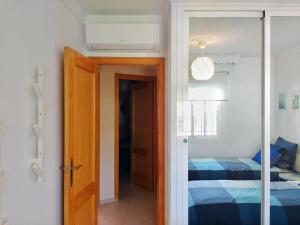 A bed or beds in a room at Apartamento Picasso