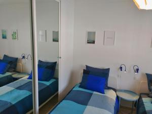 A bed or beds in a room at Apartamento Picasso