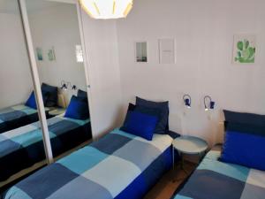 A bed or beds in a room at Apartamento Picasso