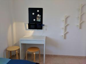 A television and/or entertainment centre at Apartamento Picasso