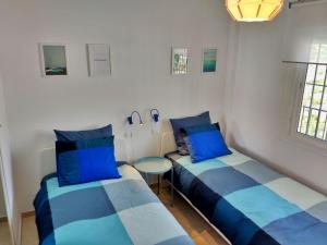 A bed or beds in a room at Apartamento Picasso Még 37 kép