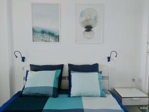 A bed or beds in a room at Apartamento Picasso