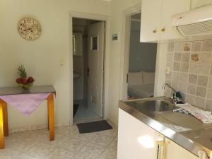 Koupelna v ubytování Epi Apartments + 37 fotografií