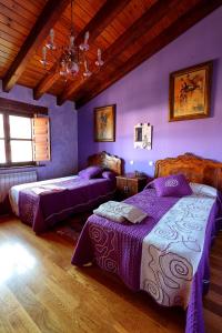 En eller flere senger på et rom på Canalba Casa Rural