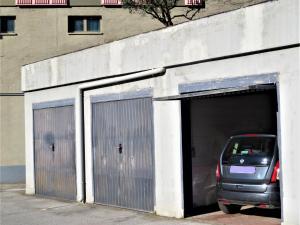 a car is parked inside of a garage at Quarto di Luna in Genoa