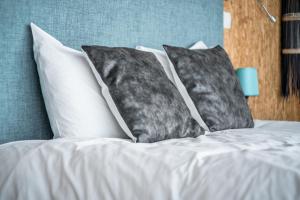 Uma cama ou camas num quarto em Natura Glamping