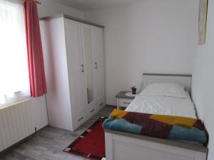 Posteľ alebo postele v izbe v ubytovaní Ferienwohnung Huber
