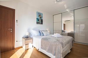 Postel nebo postele na pokoji v ubytování Adriatic dream