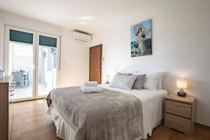 Postel nebo postele na pokoji v ubytování Adriatic dream